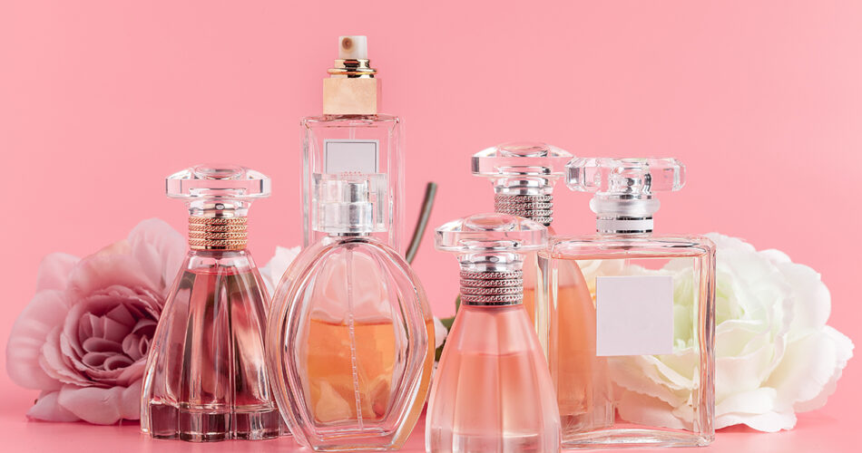 perfume bottle with roses pink fabric